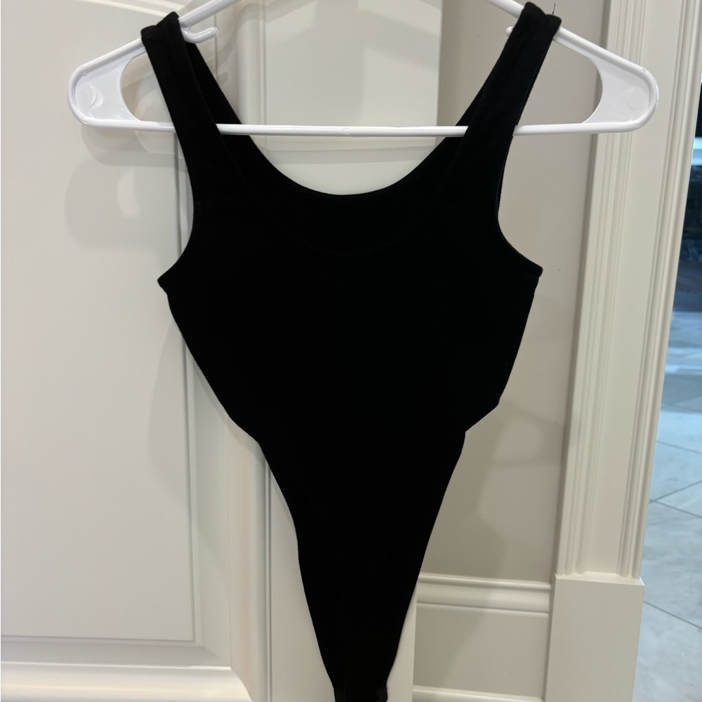 Adika black high cut bodysuit